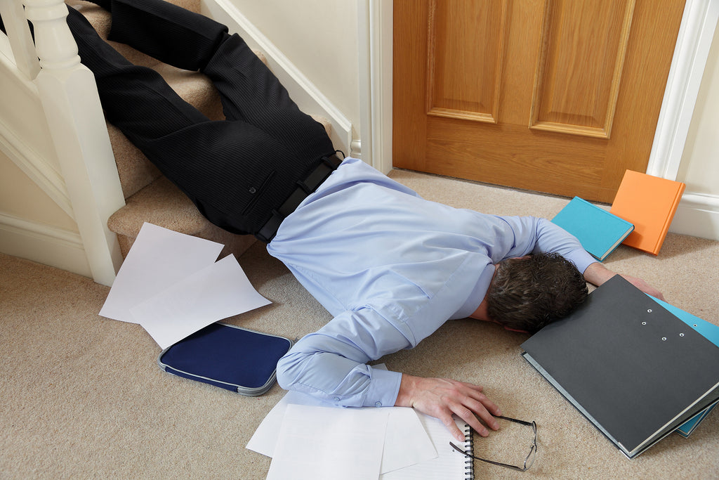 [Australia] WFH compensation win has alarming implications for businesses - man at bottom of stairs surrounded by paperwork after fall, controversial working from home comp claim Australia