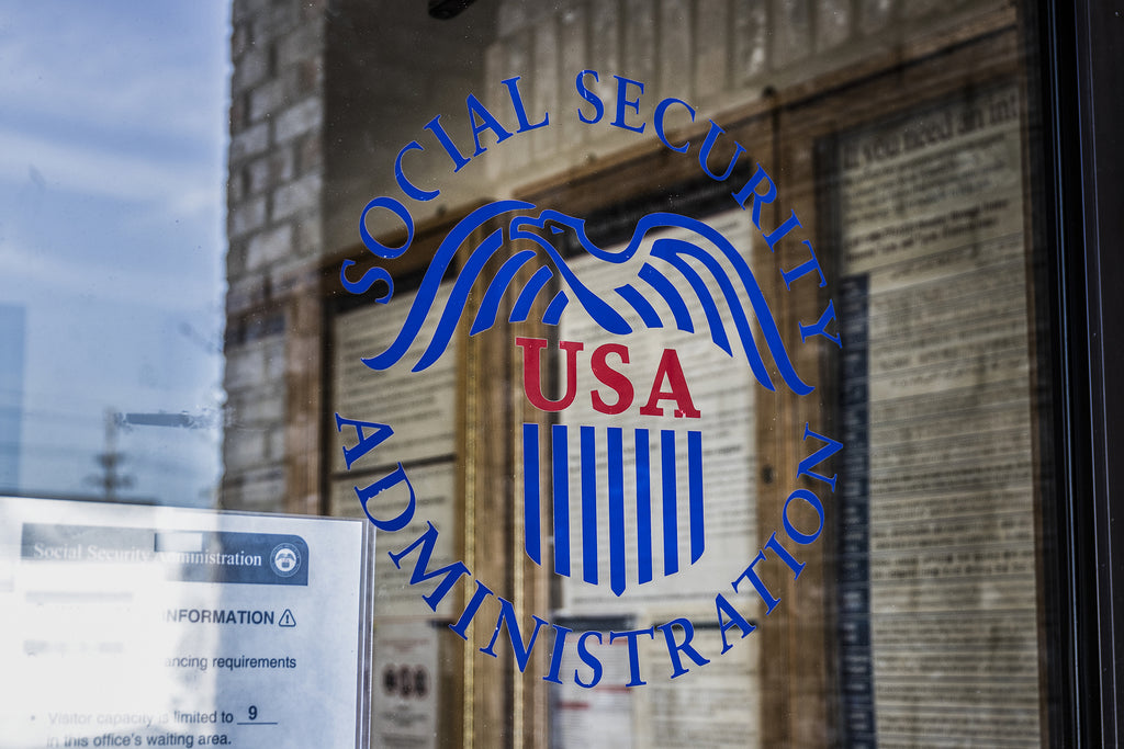 [US] Proposed rule for Payroll Information Exchange published - US Social Security Administration crest on exterior window, Social Security Administration proposes rule to improve PIE